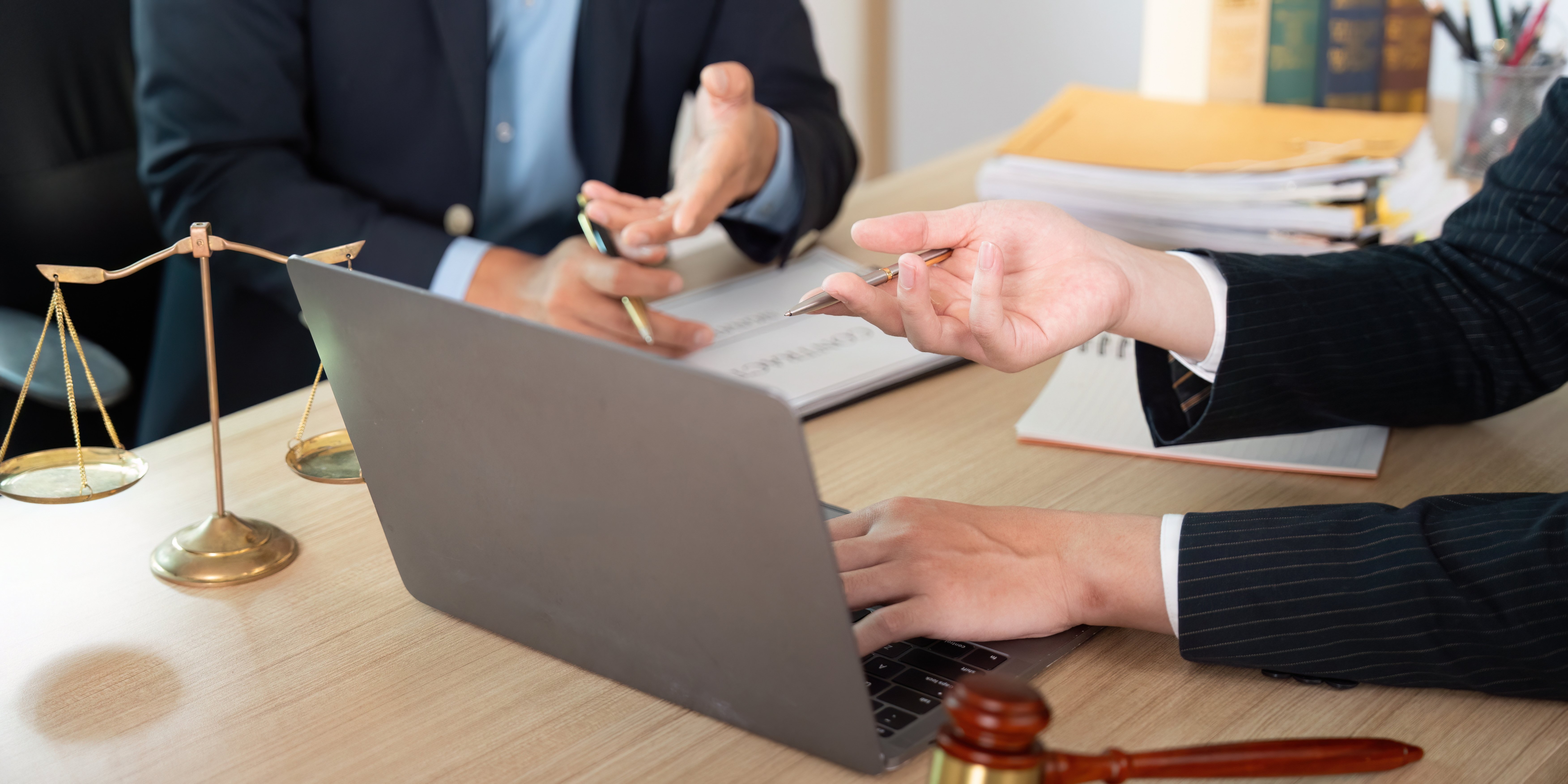 Lawyers working on laptop 